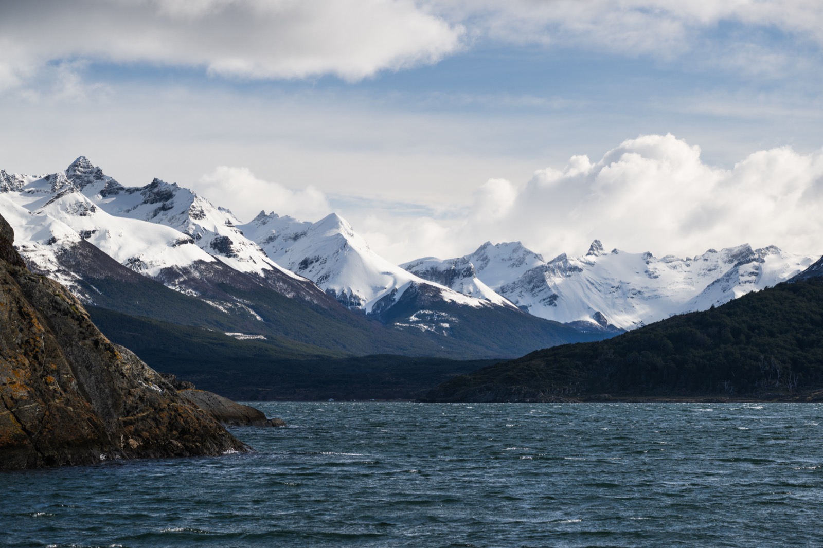 The Balmaceda hanging glacier descending to the Última Esperanza fjord with floating ice